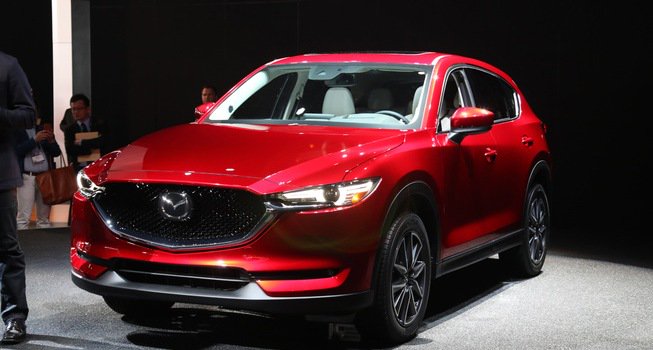 BOB半岛开发生物塑料汽车外饰件 CX-5率先应用(图1)